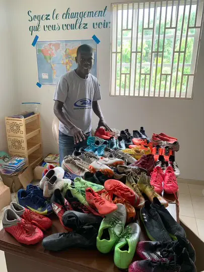 New partner in Haiti receiving gently used soccer gear donated by Rush Soccer
